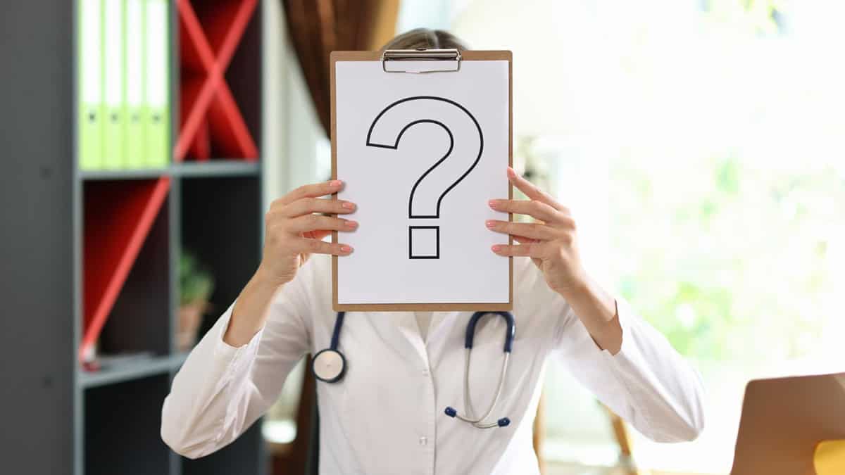 A female doctor with a question sign