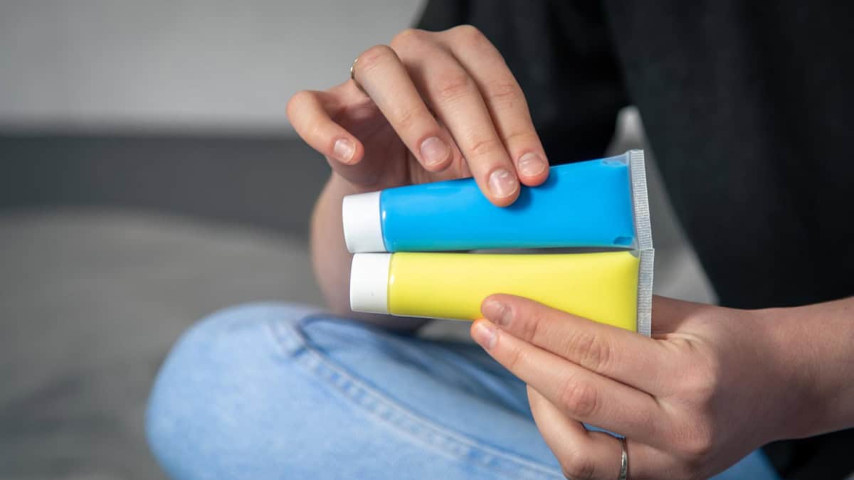 Women holding ointment tubes