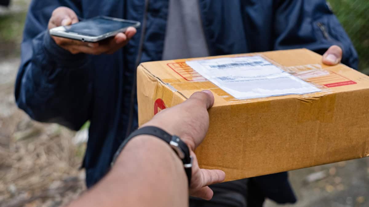 Person receiving a mail package