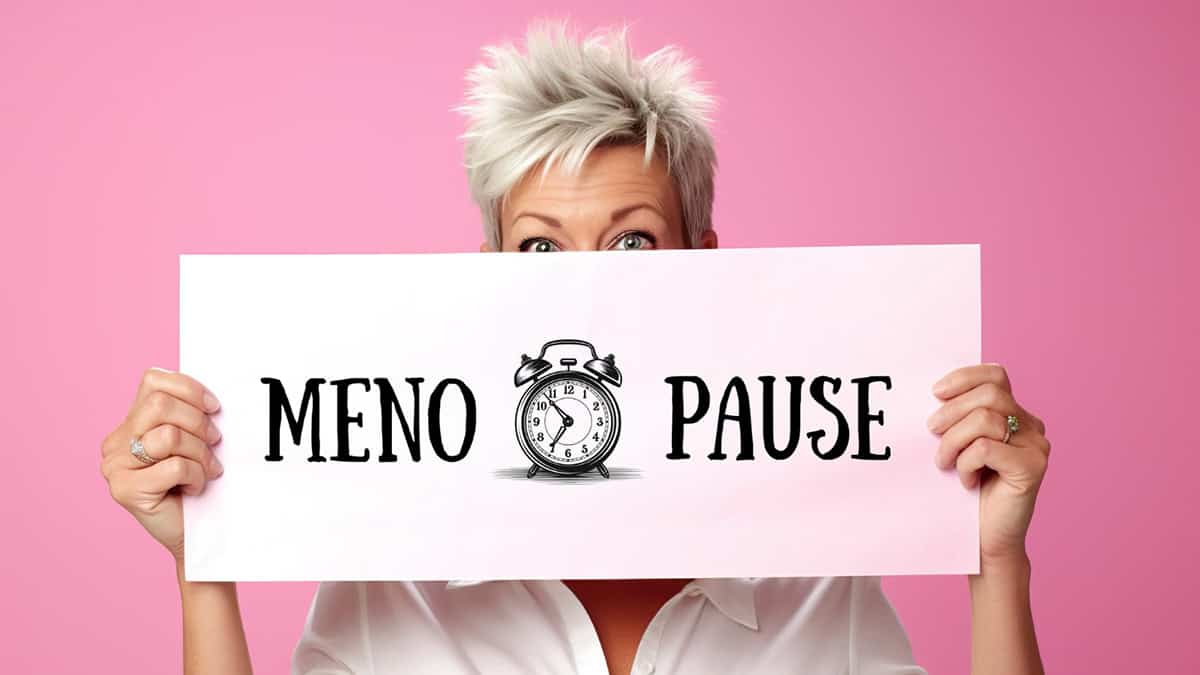 Women holding a Menopause sign