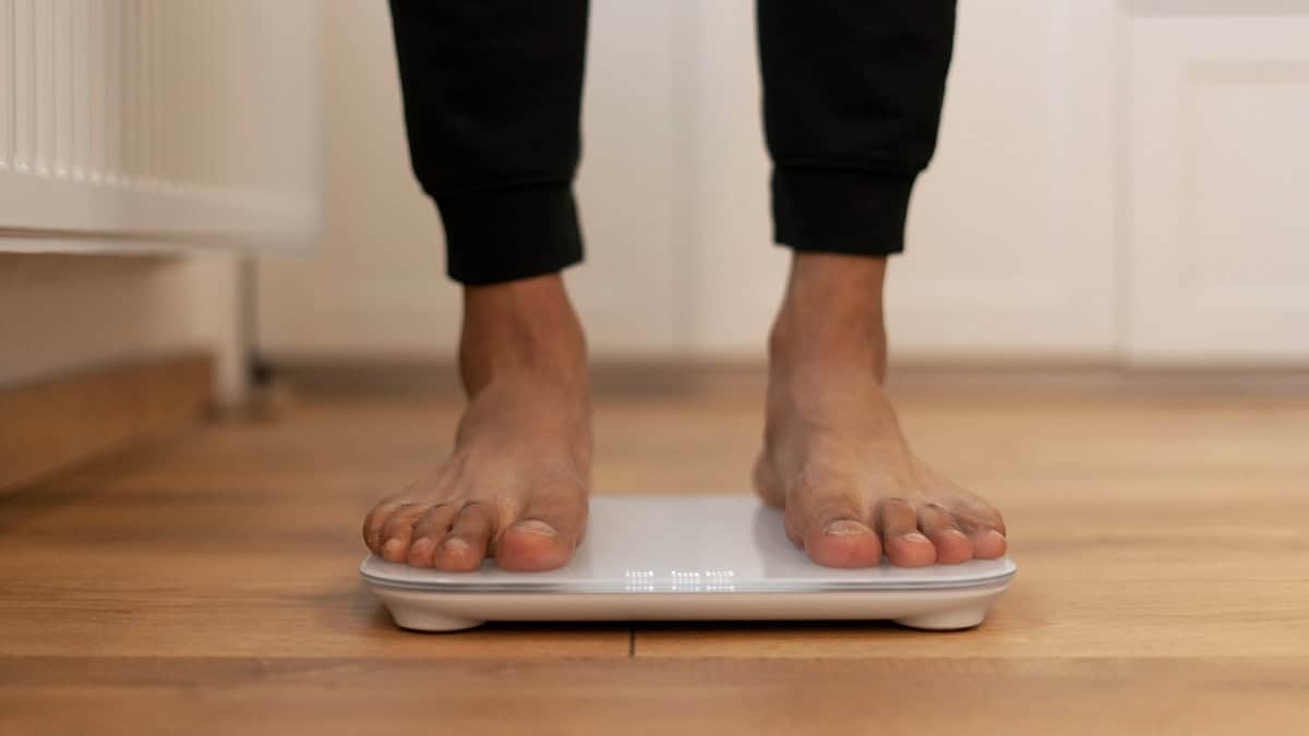 Person standing on weighing scale