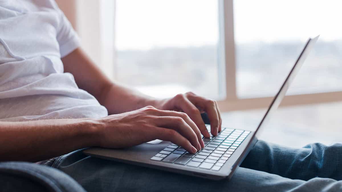 Person surfing the web on his laptop